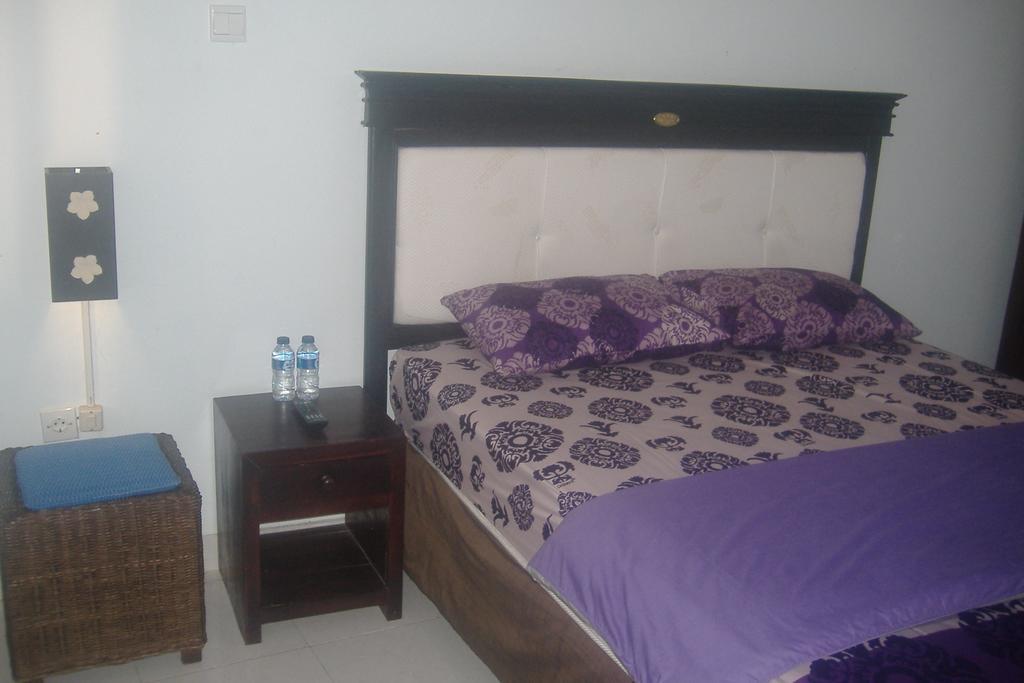 Mustika Inn Кута Номер фото
