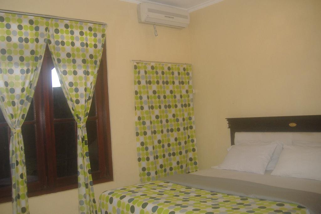 Mustika Inn Кута Номер фото