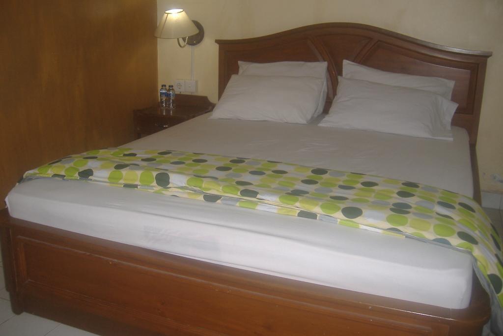 Mustika Inn Кута Номер фото