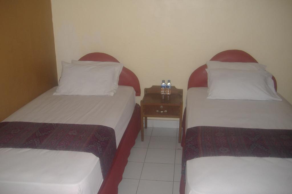 Mustika Inn Кута Номер фото