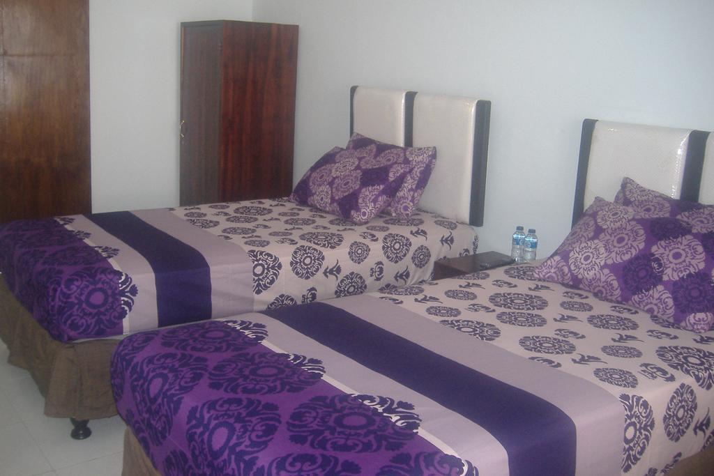 Mustika Inn Кута Номер фото