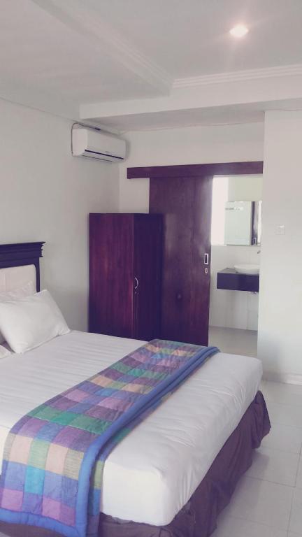Mustika Inn Кута Номер фото