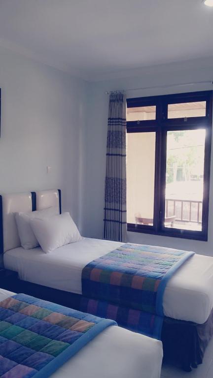 Mustika Inn Кута Номер фото