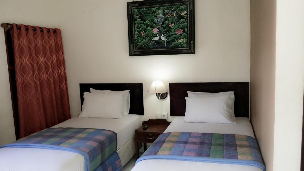 Mustika Inn Кута Номер фото