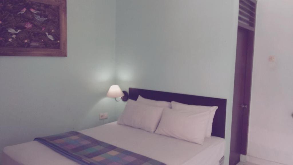 Mustika Inn Кута Номер фото