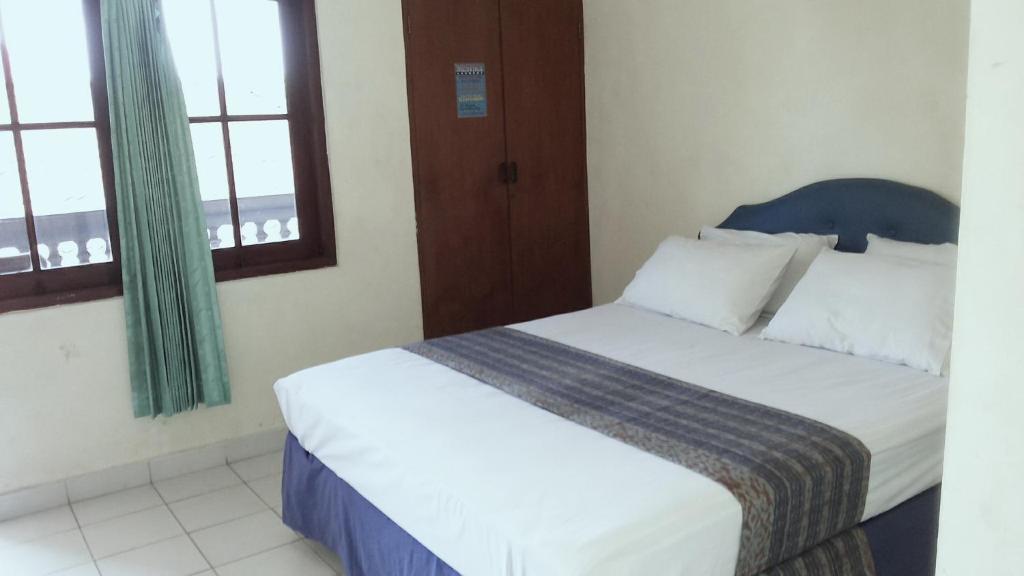 Mustika Inn Кута Номер фото