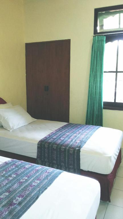 Mustika Inn Кута Номер фото