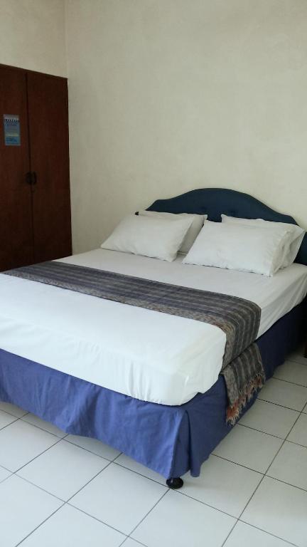 Mustika Inn Кута Номер фото