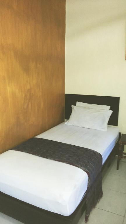 Mustika Inn Кута Номер фото