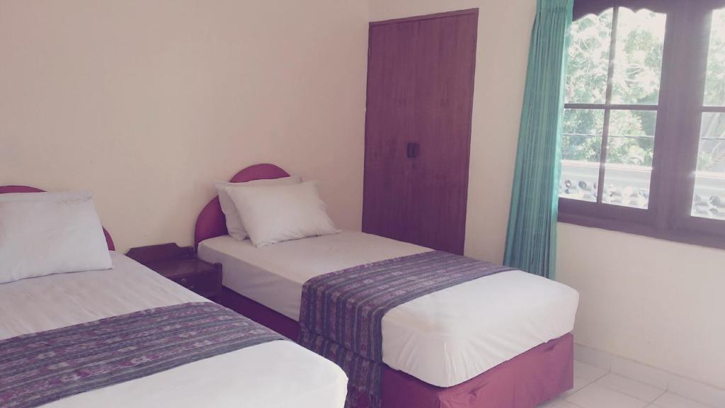 Mustika Inn Кута Номер фото