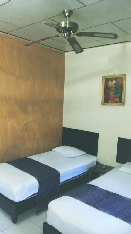 Mustika Inn Кута Номер фото