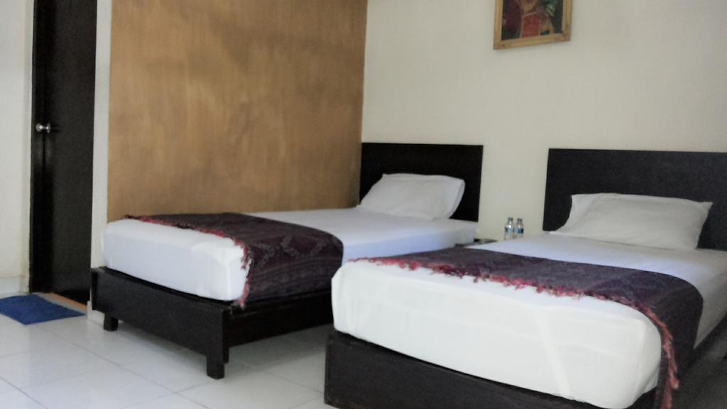 Mustika Inn Кута Экстерьер фото